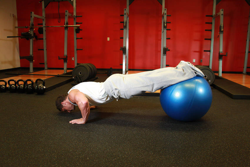Push-Ups With Feet On An Exercise Ball